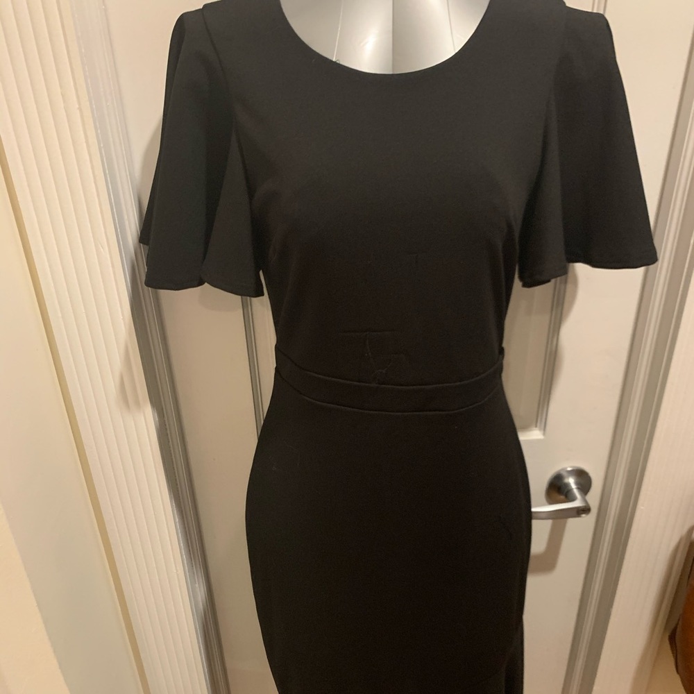 Gorgeous women’s black cocktail dress flutter